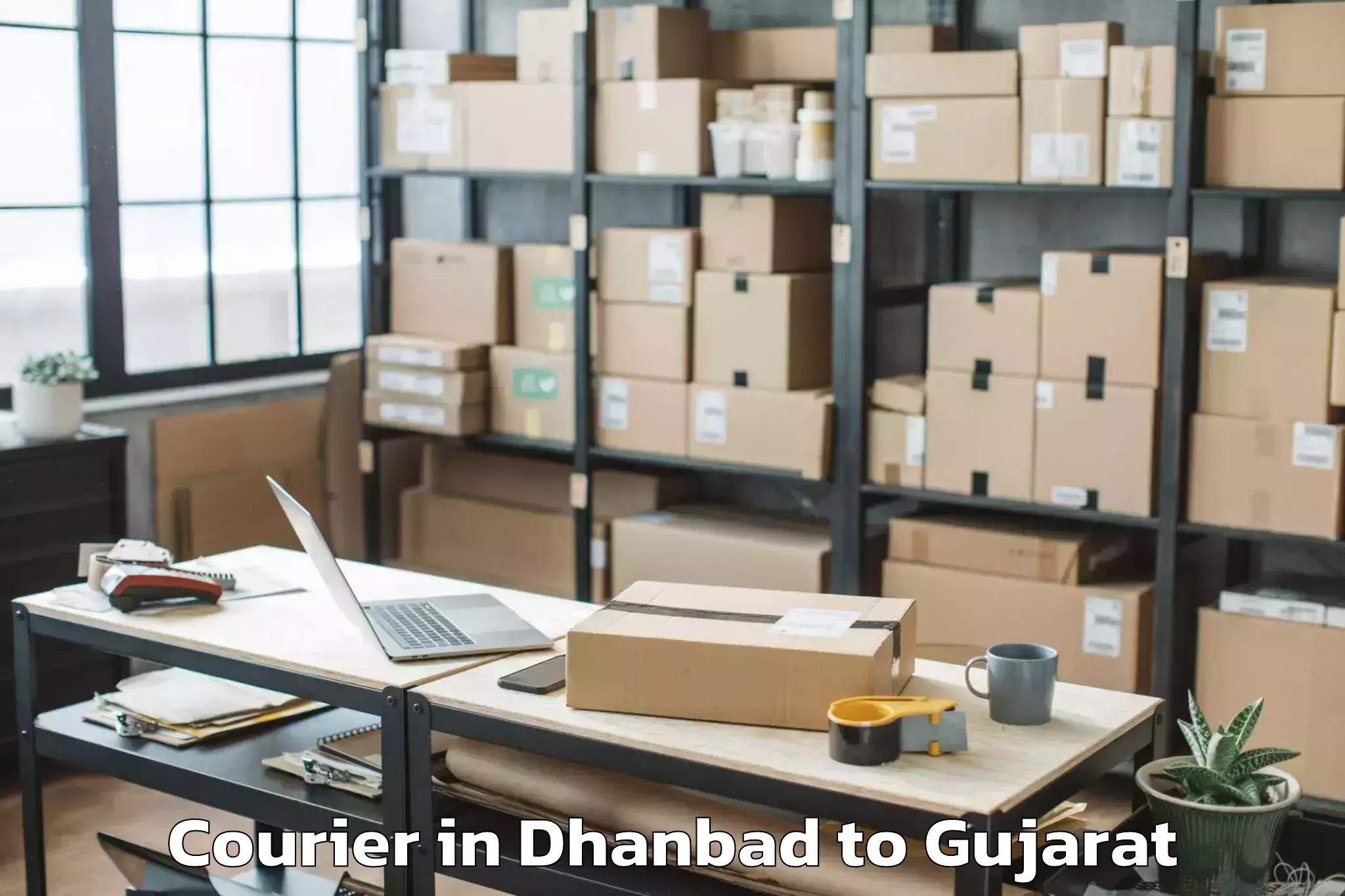 Book Your Dhanbad to Delvada Courier Today